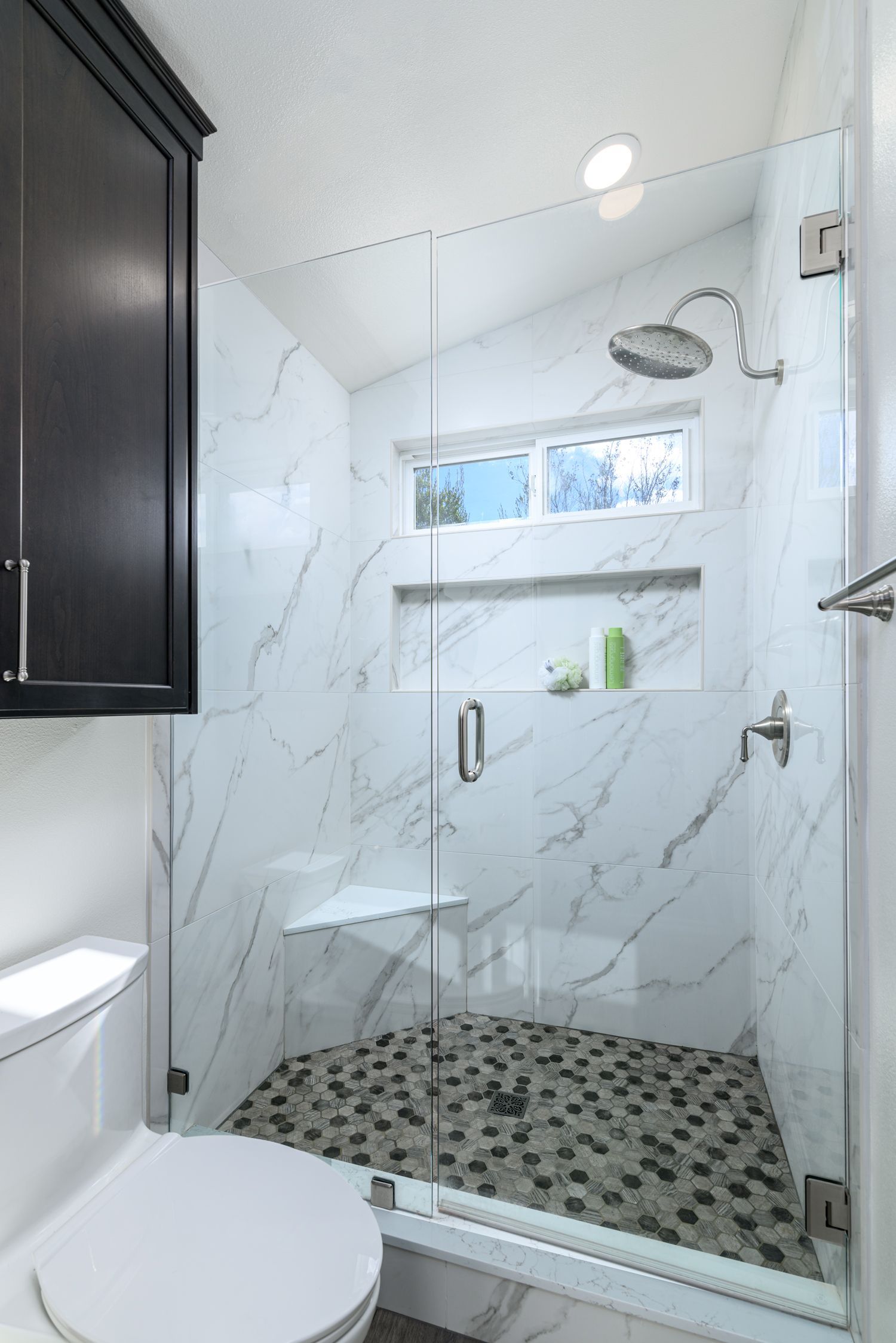 white flecked with gray shower tile, pebbly shower floor tile, large format shower tile,  master bathroom remodel, primary bathroom remodel, thousand oaks 