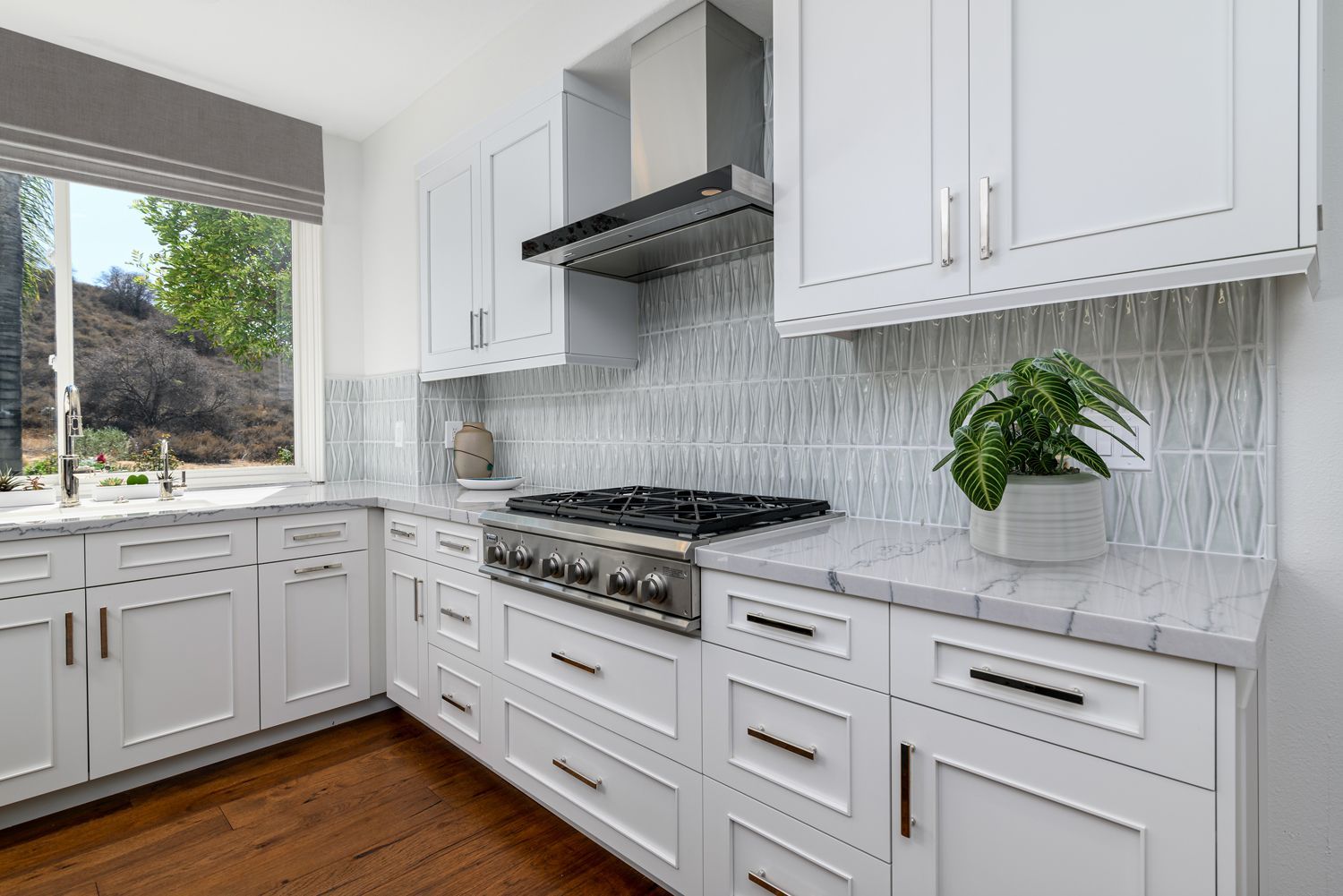 Perimeter Cabinets in Omega's Metro Door Style and Pulls by Top Knobs, Simi Valley