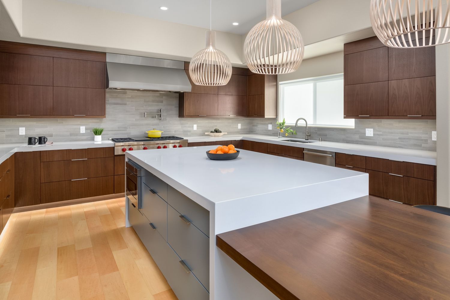 image of modern style kitchen, large center island with wood table, wood & painted cabinets, quartz countertops, kitchen addition, kitchen remodel, kitchen expansion, Thousand Oaks, CA 