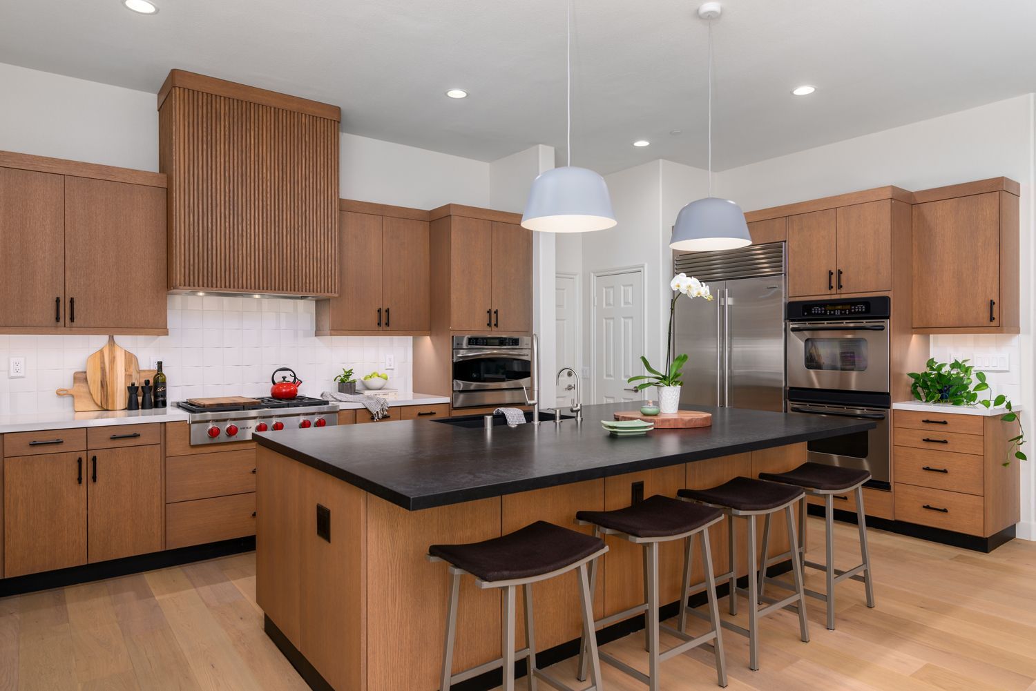 Slab Style Cabinet Doors & Black Finishes in Modern Kitchen Reface & Remodel, Newbury Park, CA 