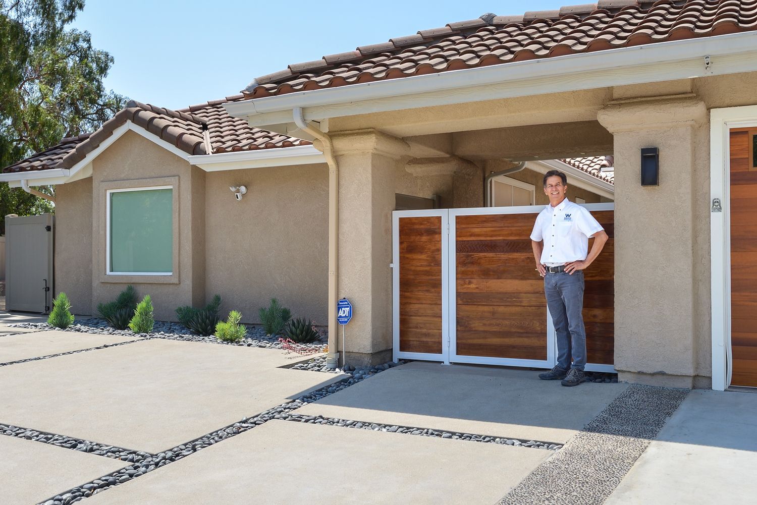 image of Bob Sturgeon, President of Westside Remodeling in front of the outside of a house, Addition Project,   2 New Bedrooms & 1 New Hall Bathroom Home, Thousand Oaks, CA 