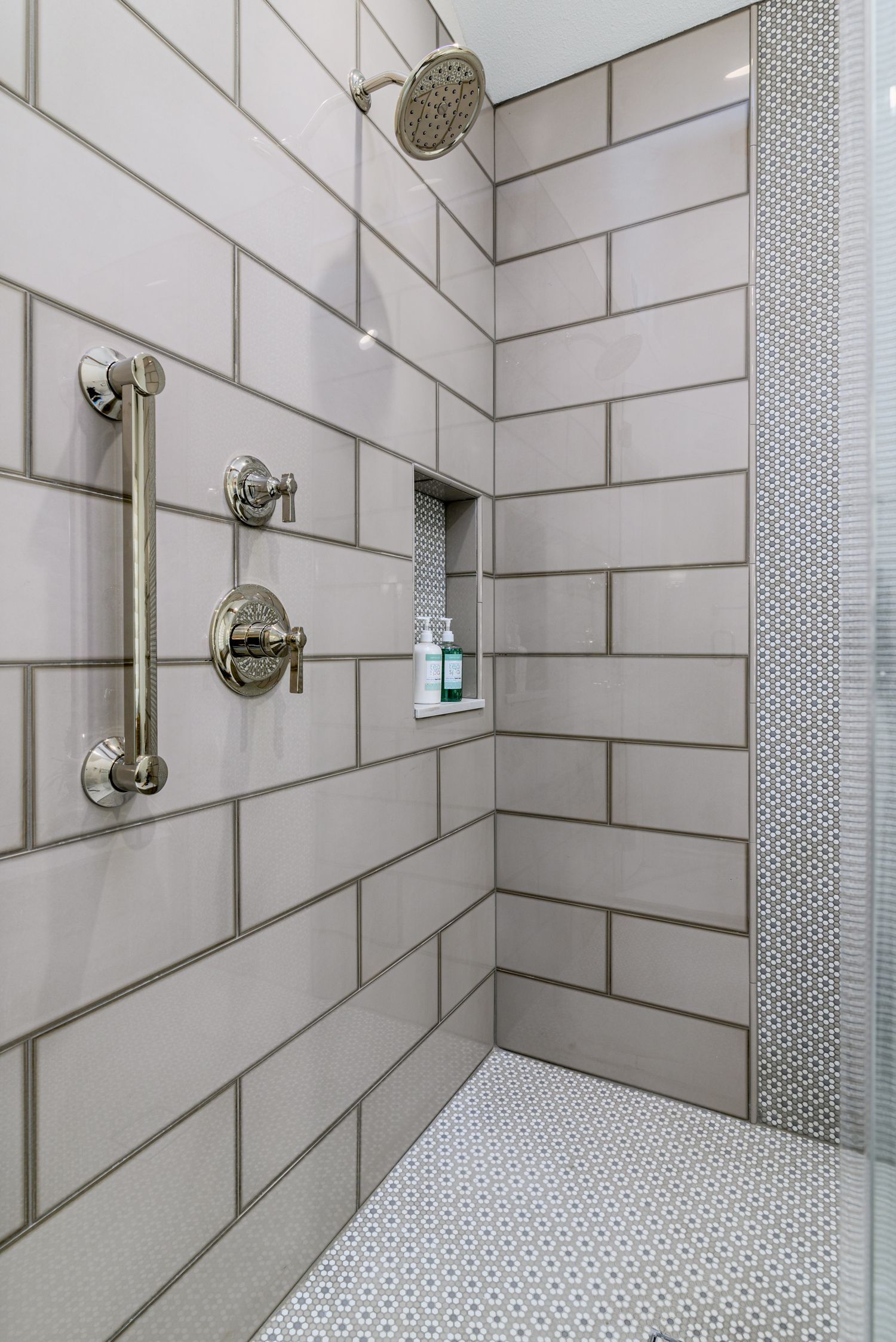 Shower Remodel with taupe tile, daisy accent liner, Newbury Park