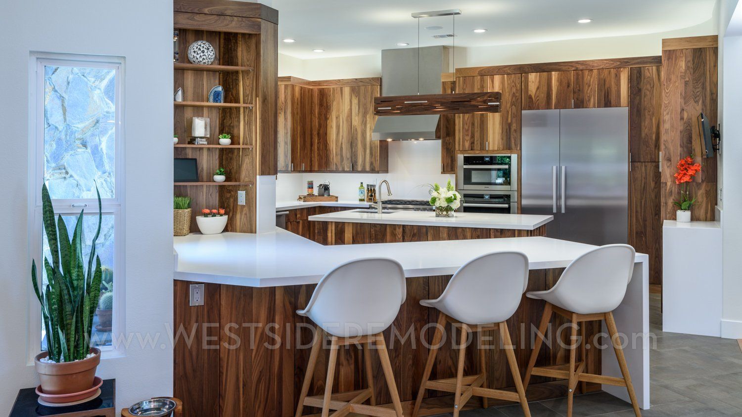 image shows a kitchen with walnut cabinetry with a Prominent Vertical Wood Grain, pensula with bar stools, open shelves & island, Kitchen Remodel, Thousand Oaks, CA 