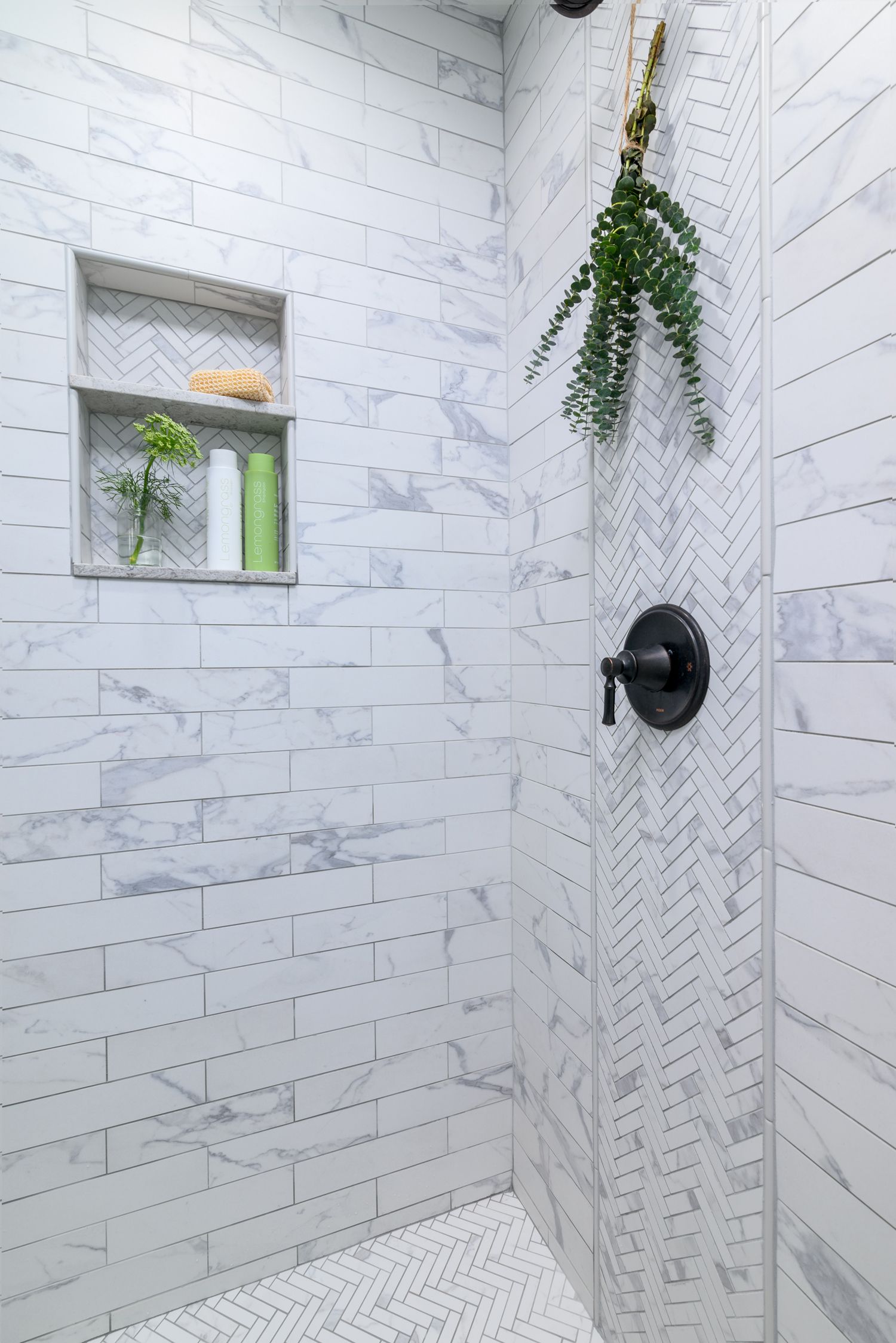 shower remodel with subway tile and herringbone tile, white and gray marbled shower tile, shampoo niche and shower bench, primary, master bathroom remodel and addition, Oak Park , CA 