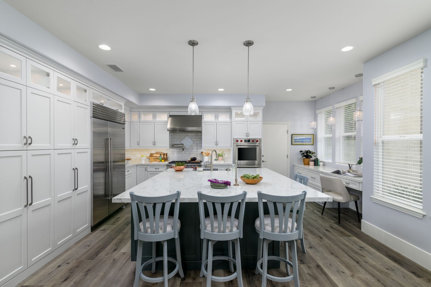 kitchen island w bar stools & white perimeter cabinetry, in Thousand Oaks Transitional Kitchen Remodel 