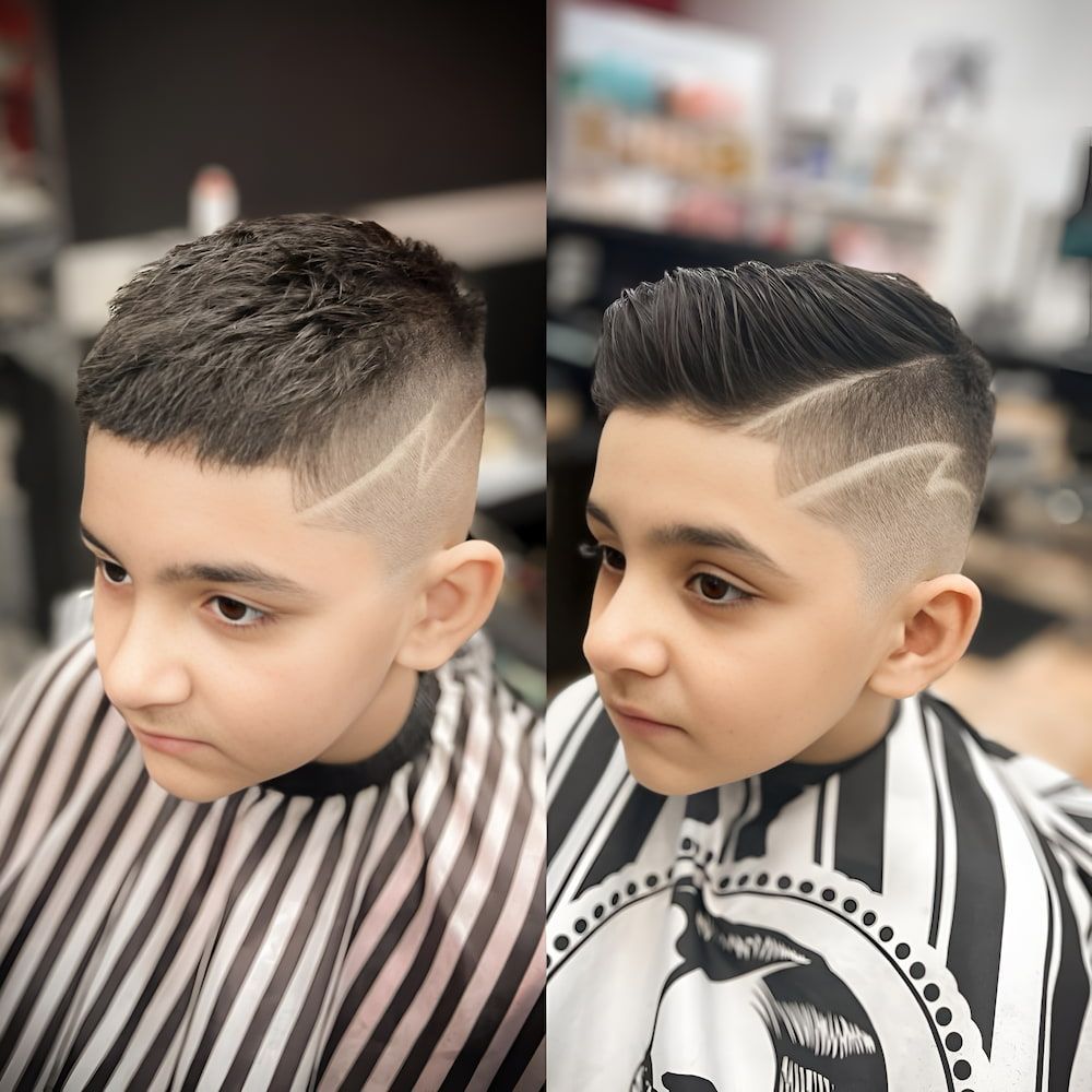 A Young Boy is Getting His Hair Cut at a Barber Shop — Hair Obsession Barber in Nightcliff, NT