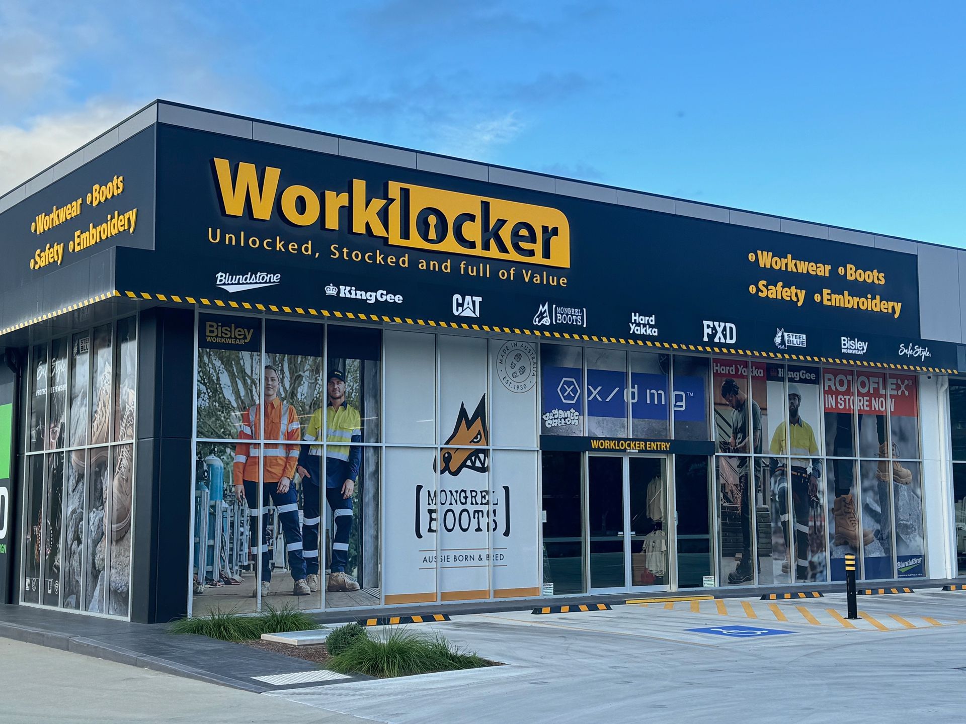 A Worklocker Store is Located on the Side of the Road — Rooney Glass in Coffs Harbour, NSW