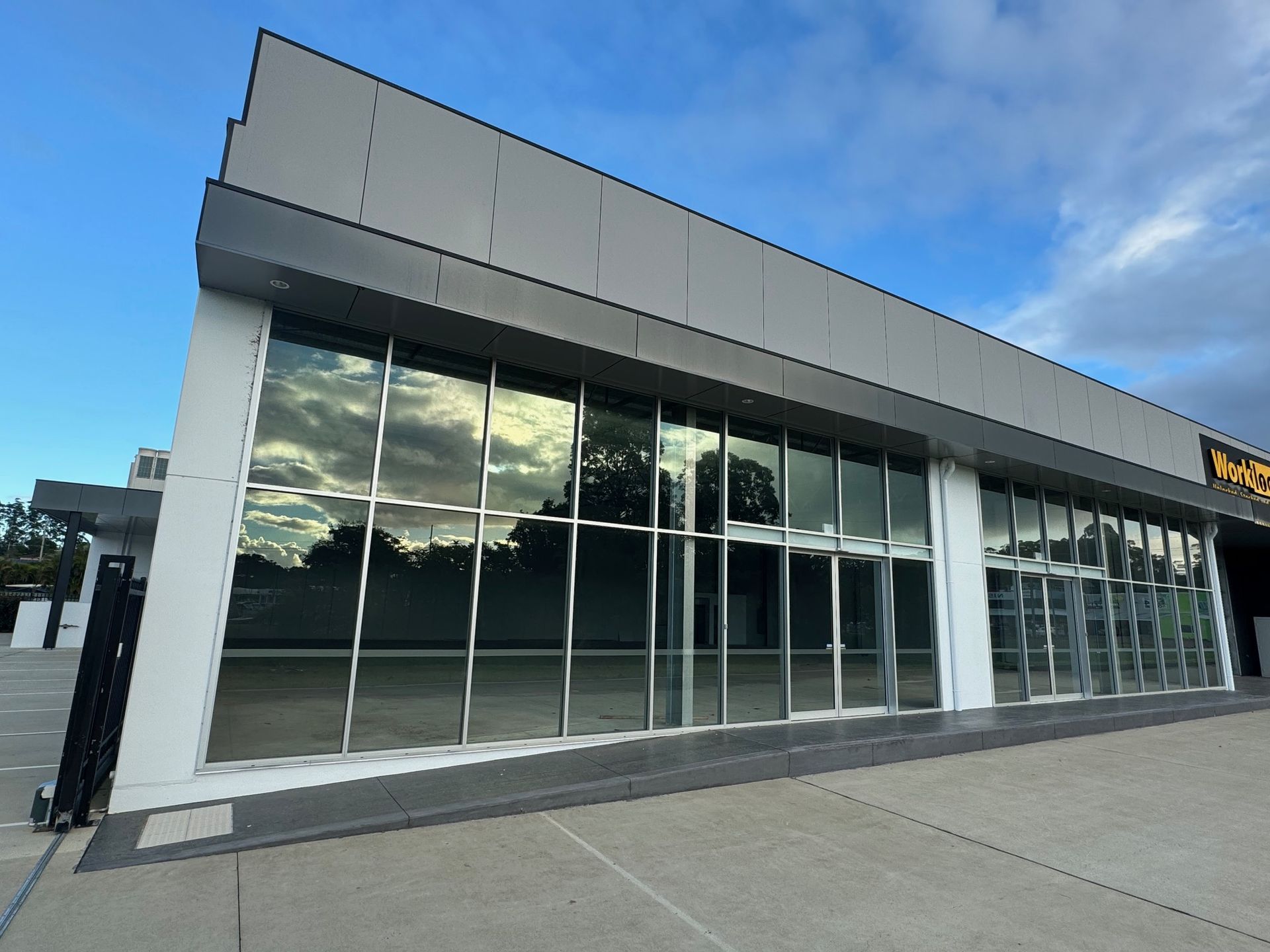 Commercial Building With A Lot Of Windows — Rooney Glass in Coffs Harbour, NSW