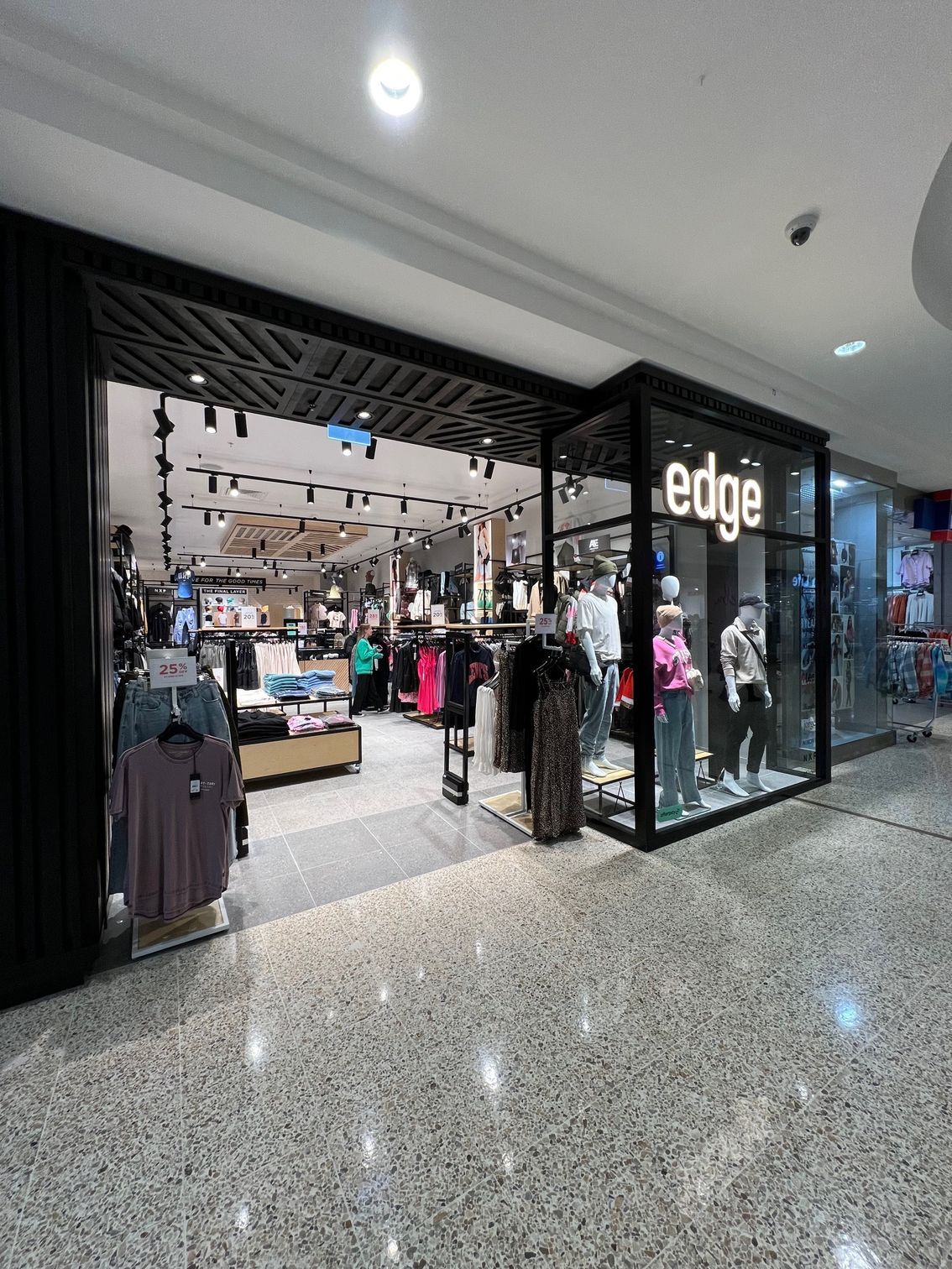 The Inside of a Clothing Store in a Shopping Mall — Rooney Glass in Coffs Harbour, NSW