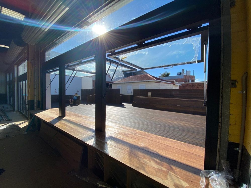 Windows Of A Building With Sunlight — Rooney Glass in Coffs Harbour, NSW
