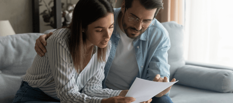 couple looking into government support