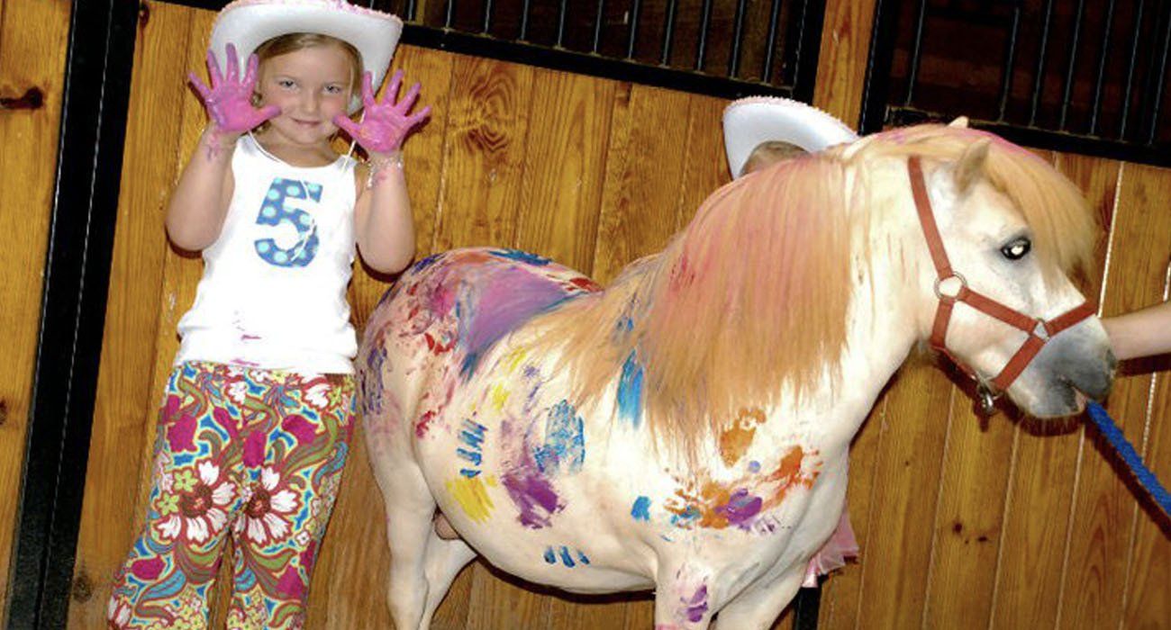 photo of girl celebrating birthday with miniature horse