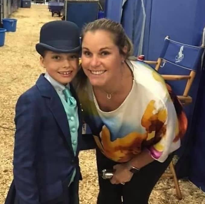 photo of Lenux owner Brooke VanderSpuy with her daughter, Lyla, at a horse show