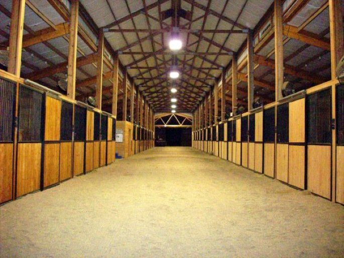 photo of Lenux Stables 200-foot indoor barn aisle