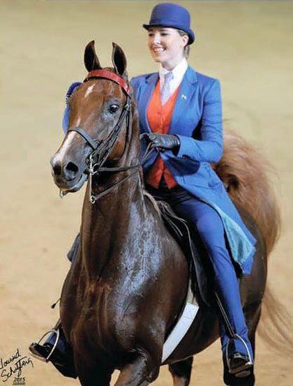 photo of girl riding American Saddlebred horse in competition