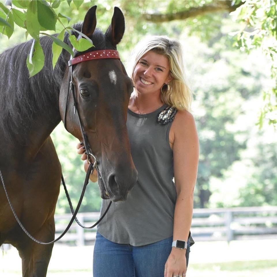 photo of Lenux Stables instructor Lauren Riggins with her horse, Texas Pete