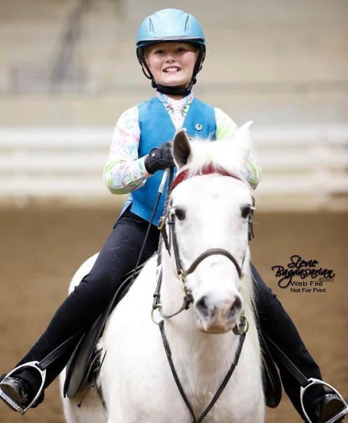 photo of girl on white pony in lineup at horse show