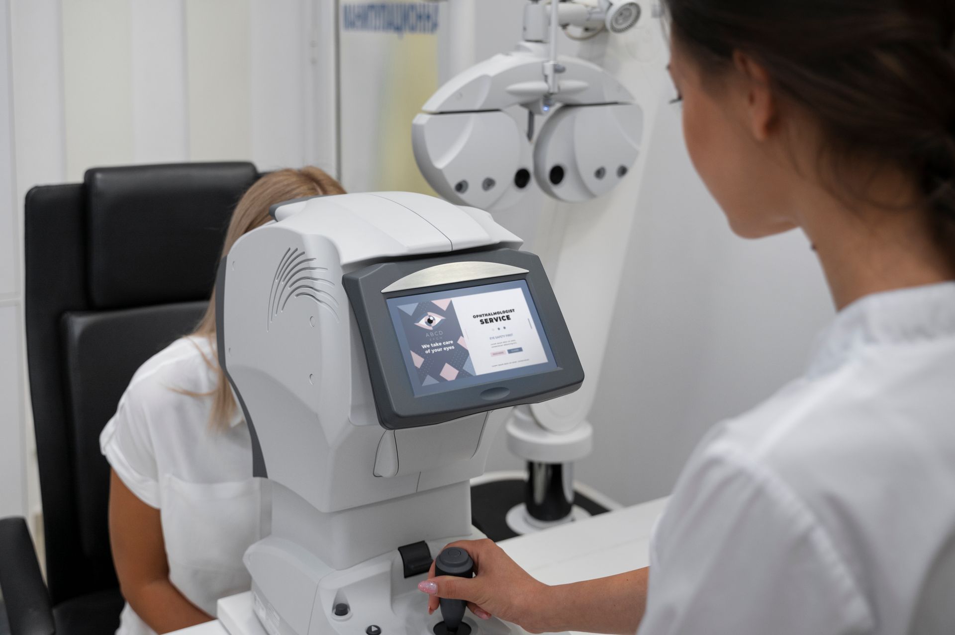 A woman is getting her eyes checked by an ophthalmologist.