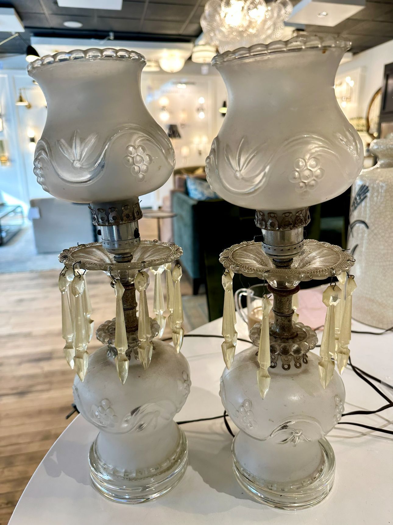 Two antique glass table lamps with frosted shades and crystal drops.