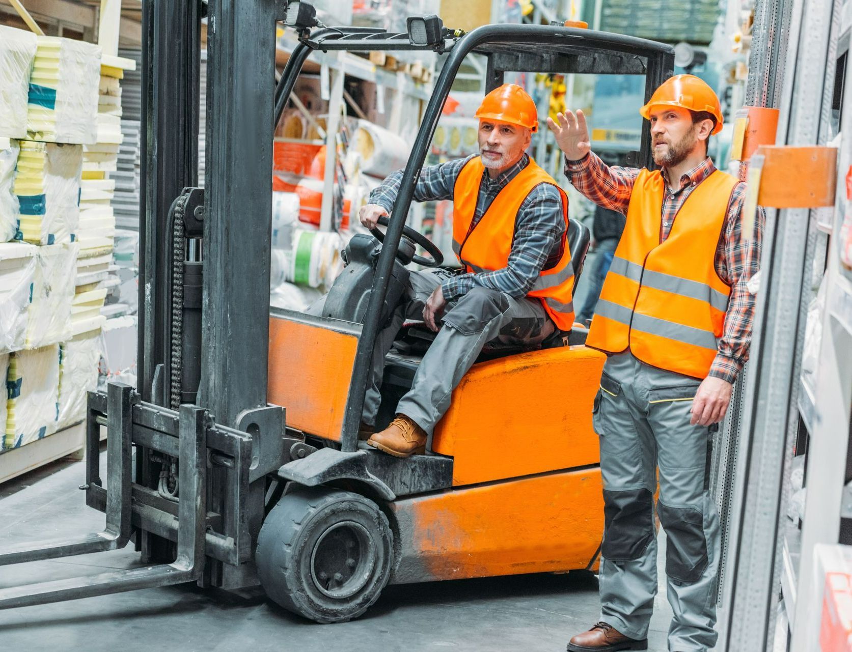 Combilift forklift being operated by man in high-vis coat