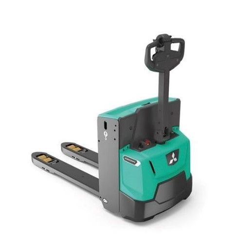 A green and black pallet truck is sitting on a white surface.