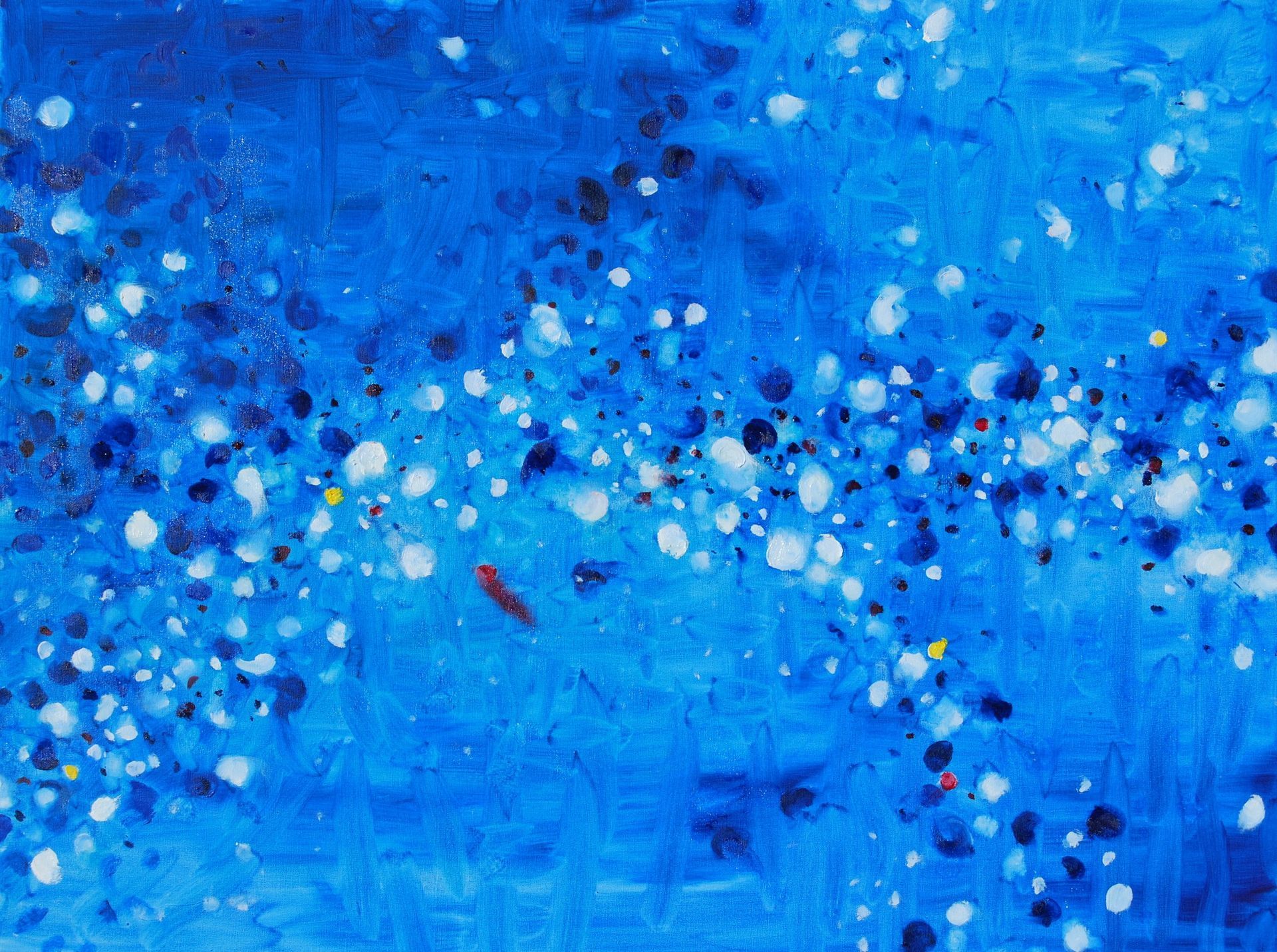 A close up of a blue painting with white dots on it.