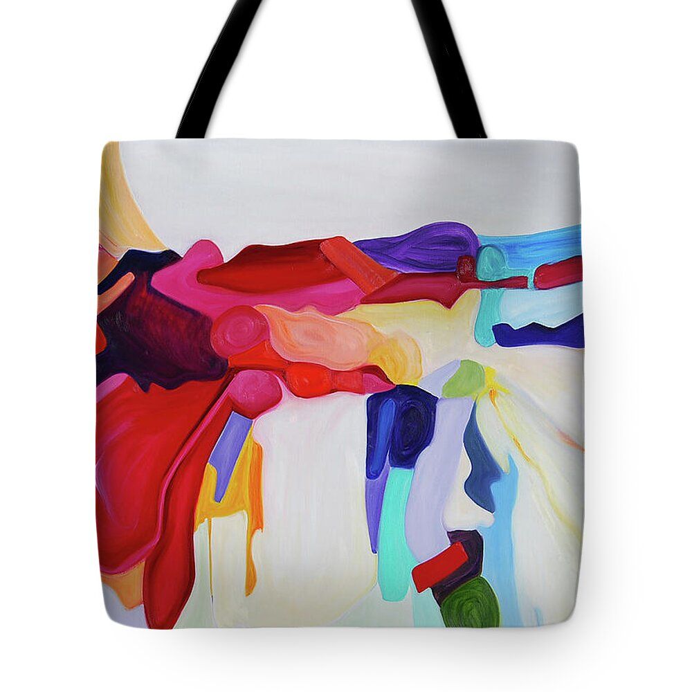 A tote bag with a colorful painting on it