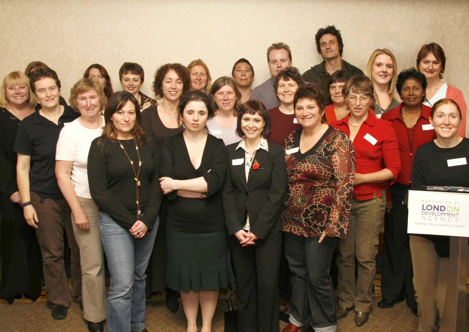 Group shot of smiling attendees at AGM.