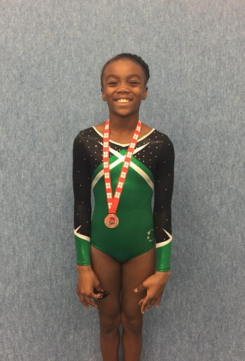 gymnast with medals competing at the English championships