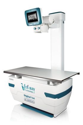 Veterinary X-ray machine with adjustable monitor and examination table, white and teal