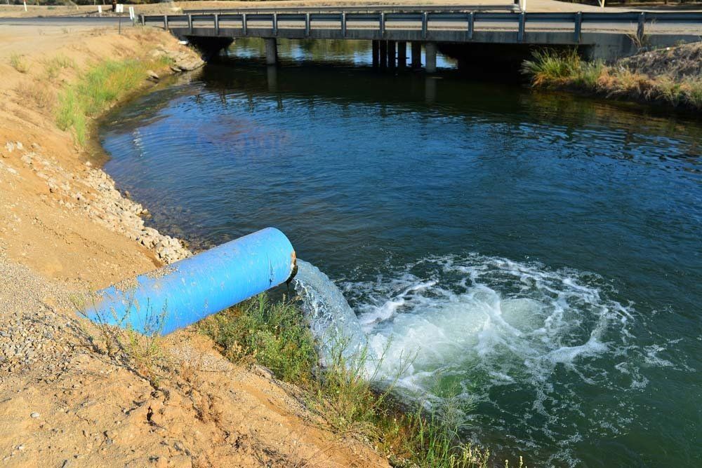 Water Being Pumped Into Canal — Irrigation Supplies in Yeppoon, QLD