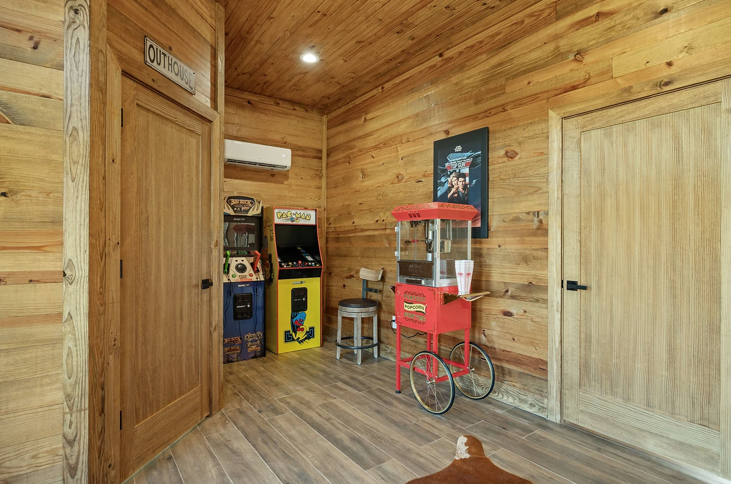 There is a popcorn machine in the middle of the room.