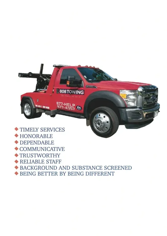 A red tow truck is sitting on top of a white surface.