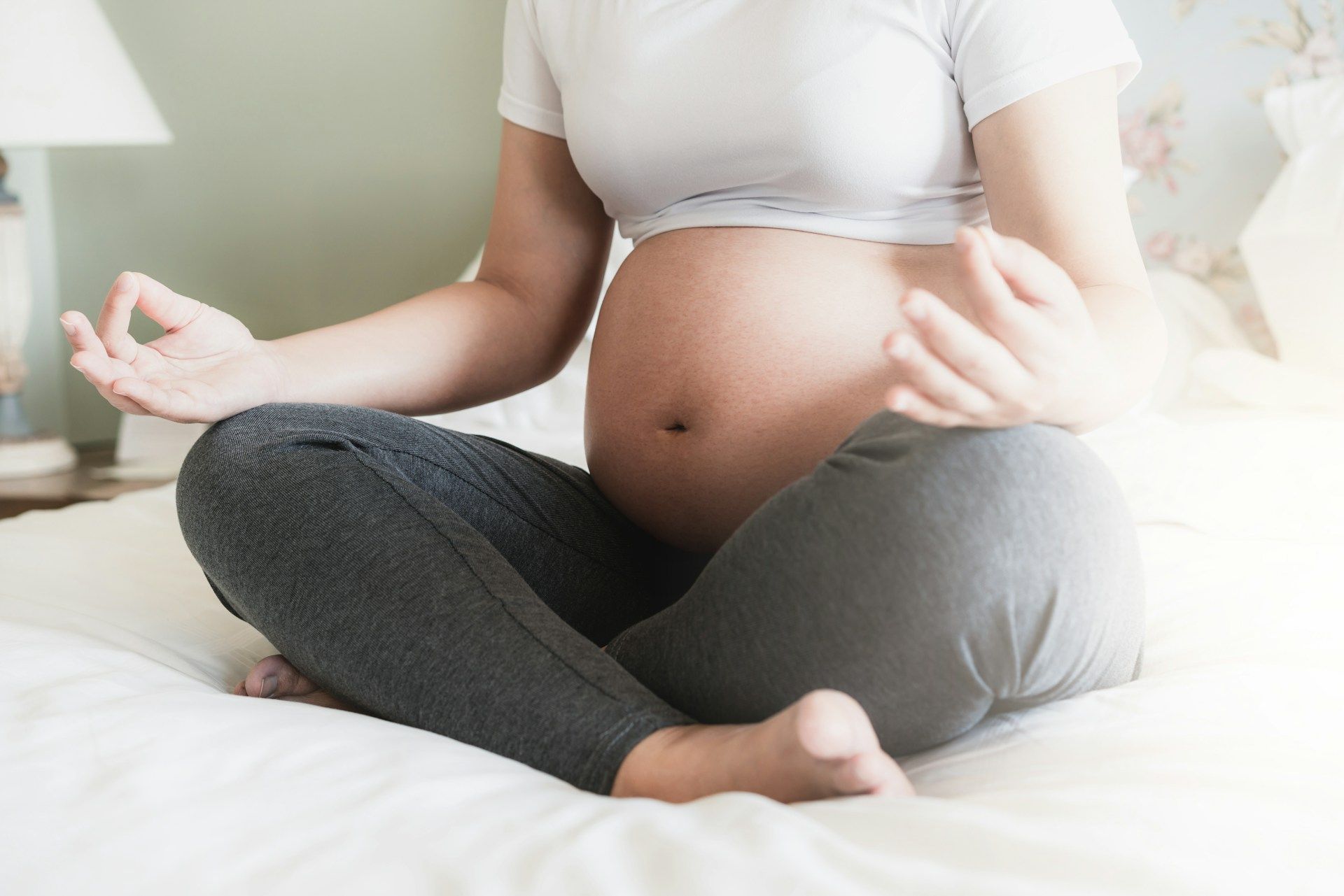 pregnant woman on the bed