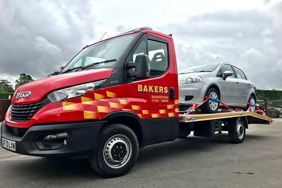 Bakers Vehicle Recovery Truck with Car Loaded