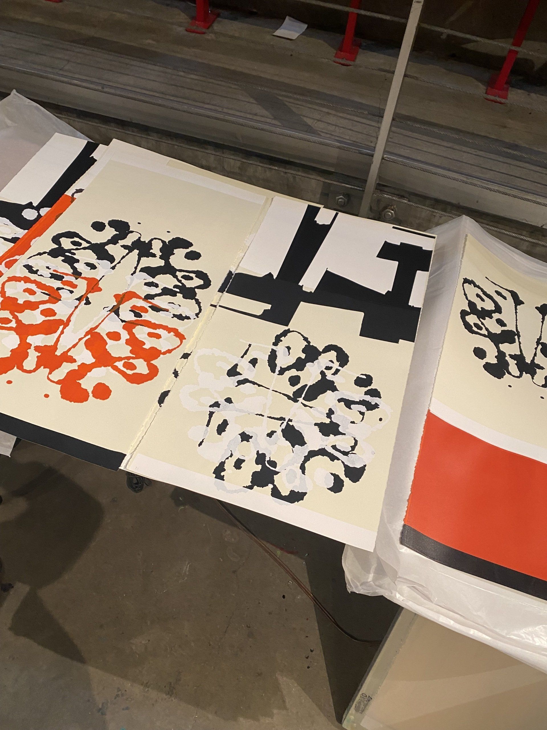 Several pieces of paper with the letter t on them