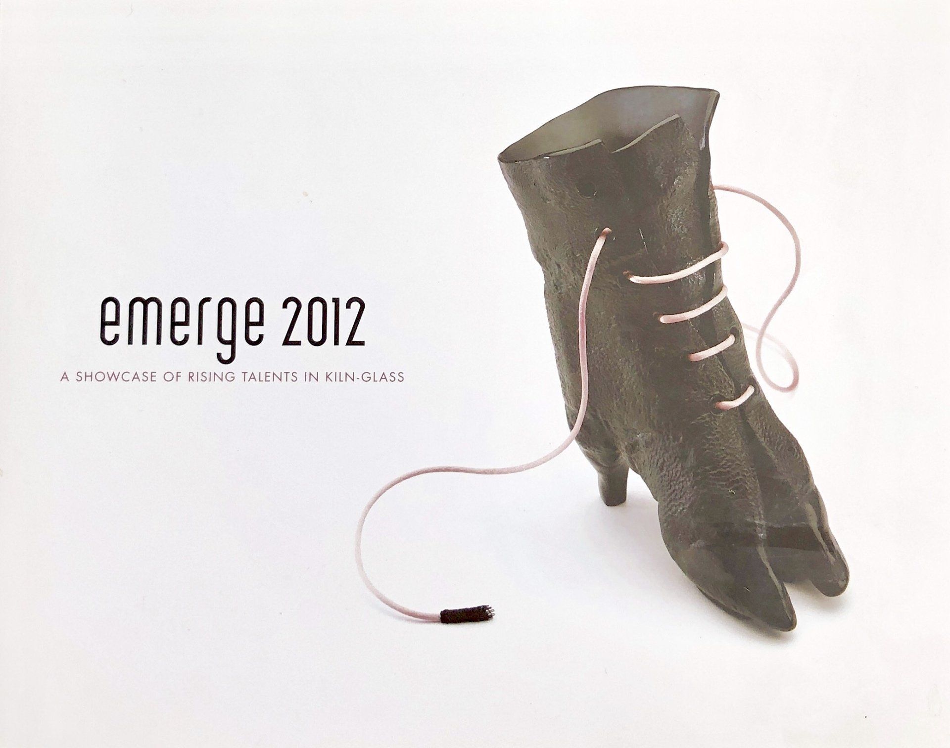 A picture of a shoe with the year 2012 on it