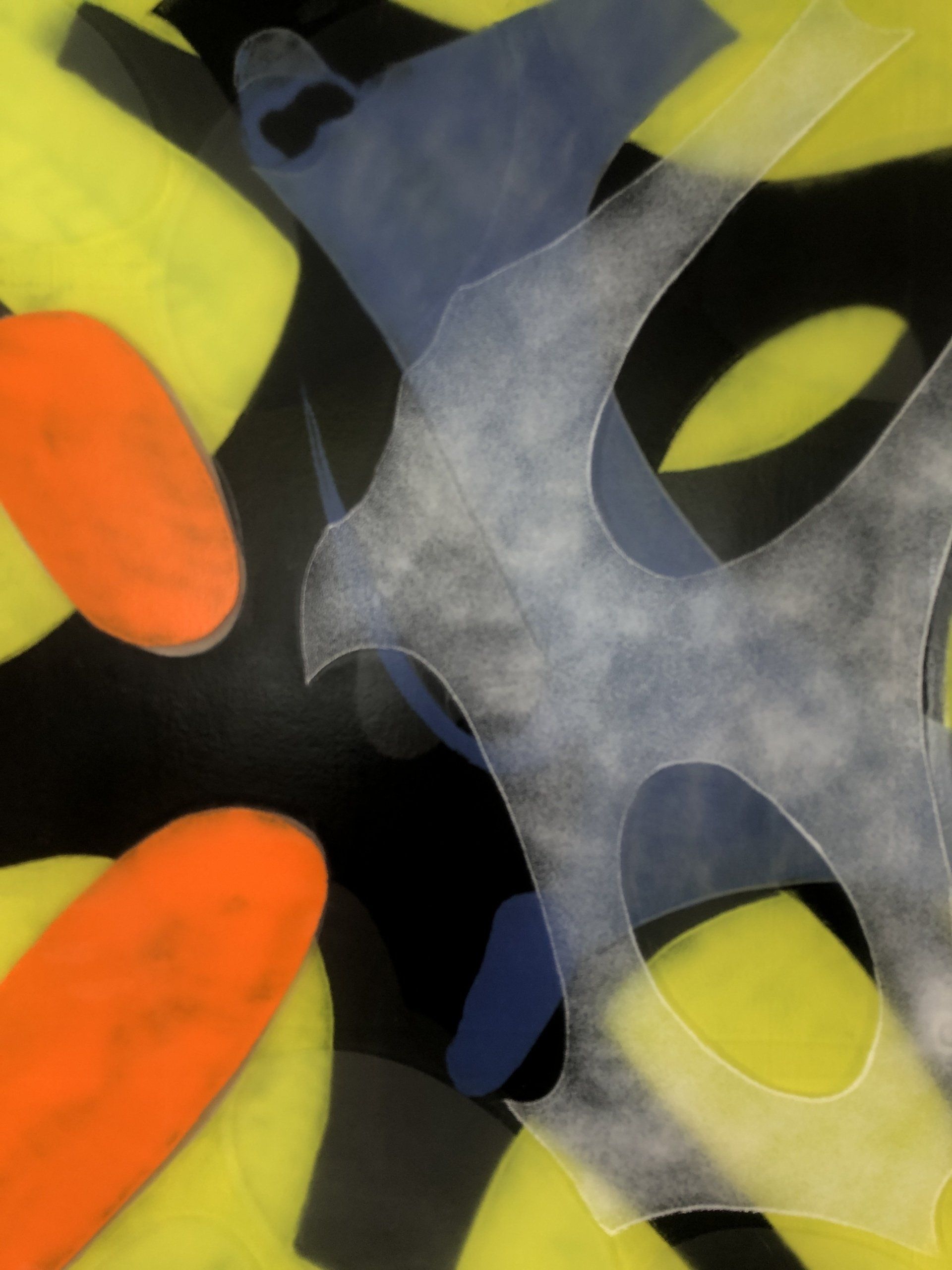 A close up of a colorful painting with orange and blue