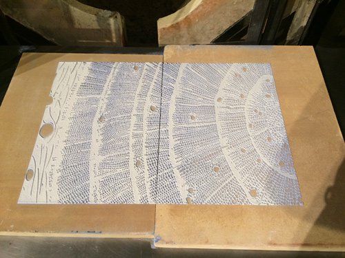 A piece of paper with a blue and white pattern on it