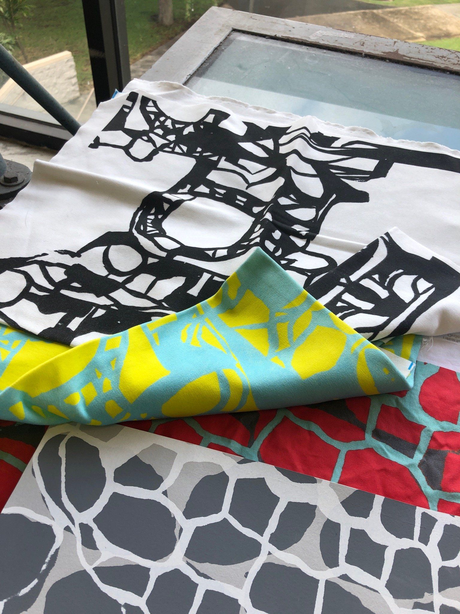 A piece of fabric with a giraffe on it