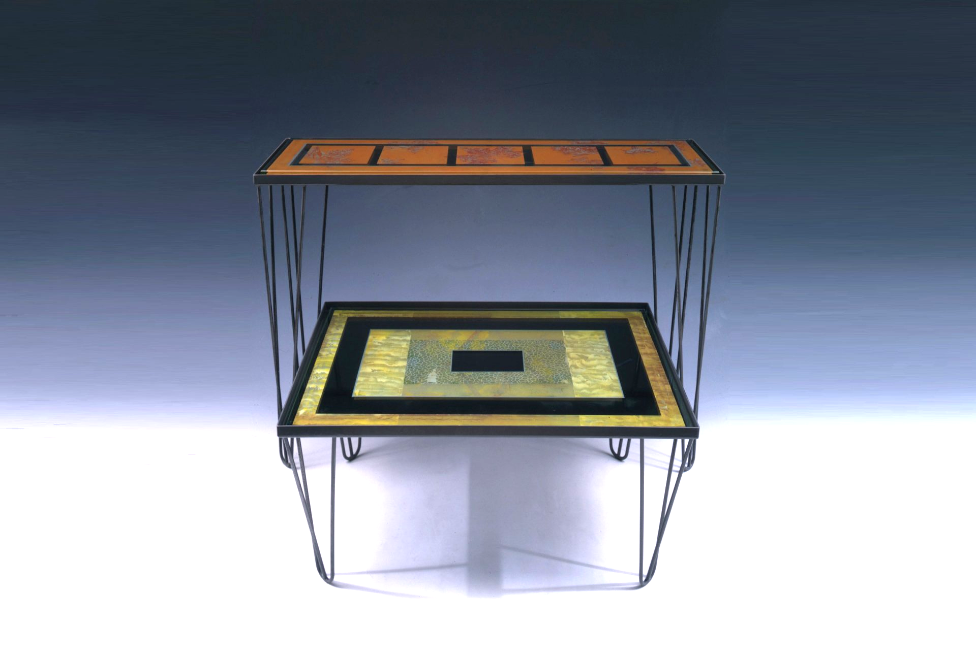 A table with a black and gold square on it