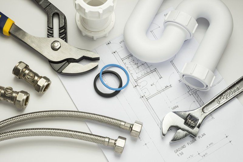 Plumbing Tools And Fittings On House Plans — Dempsey Plumbing in Killcare
