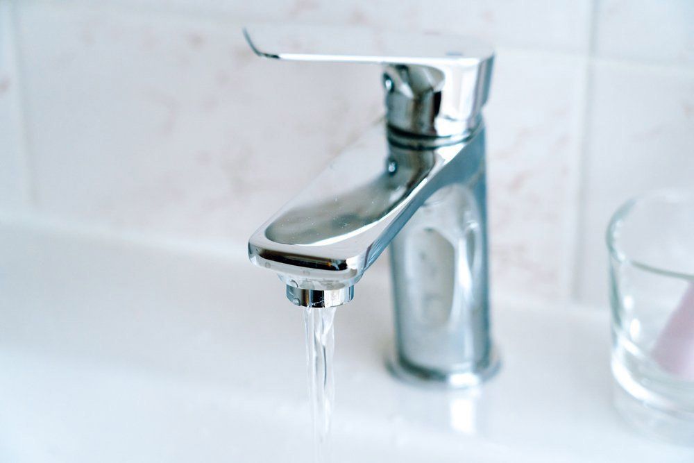 Running Water Faucet — Dempsey Plumbing in Lake Haven
