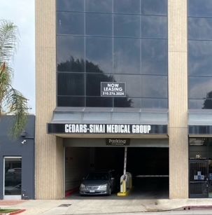 Cedars-Sinai Medical Group building with a parking entrance and 