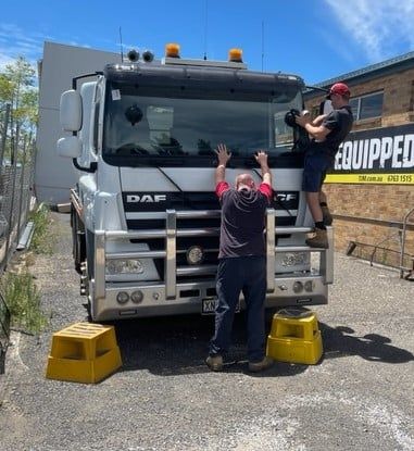 Men Performing A Fleet Service — Vehicle And Machinery Windscreens In Tamworth, NSW