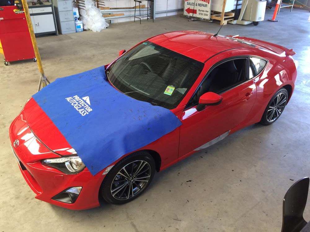 Red Sports Car With A New Windscreen — Vehicle And Machinery Windscreens In Tamworth, NSW
