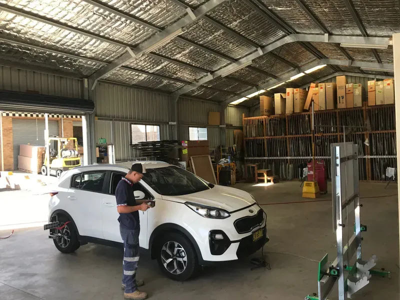 Man Performing ADAS Service — Vehicle And Machinery Windscreens In Tamworth, NSW