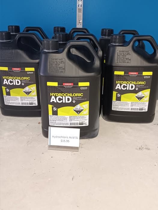 Black Containers of Hydrochloric Acid With Price Tag in Front — Banora Pools in Byron Bay, NSW