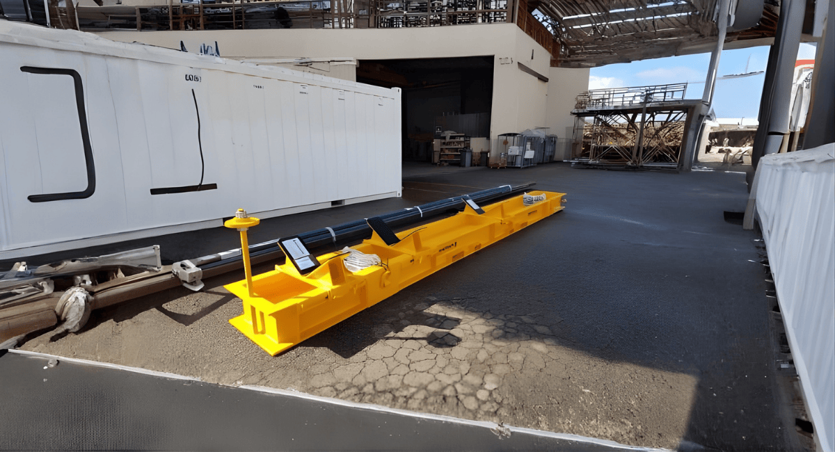 Yellow industrial mining equipment on a construction site.