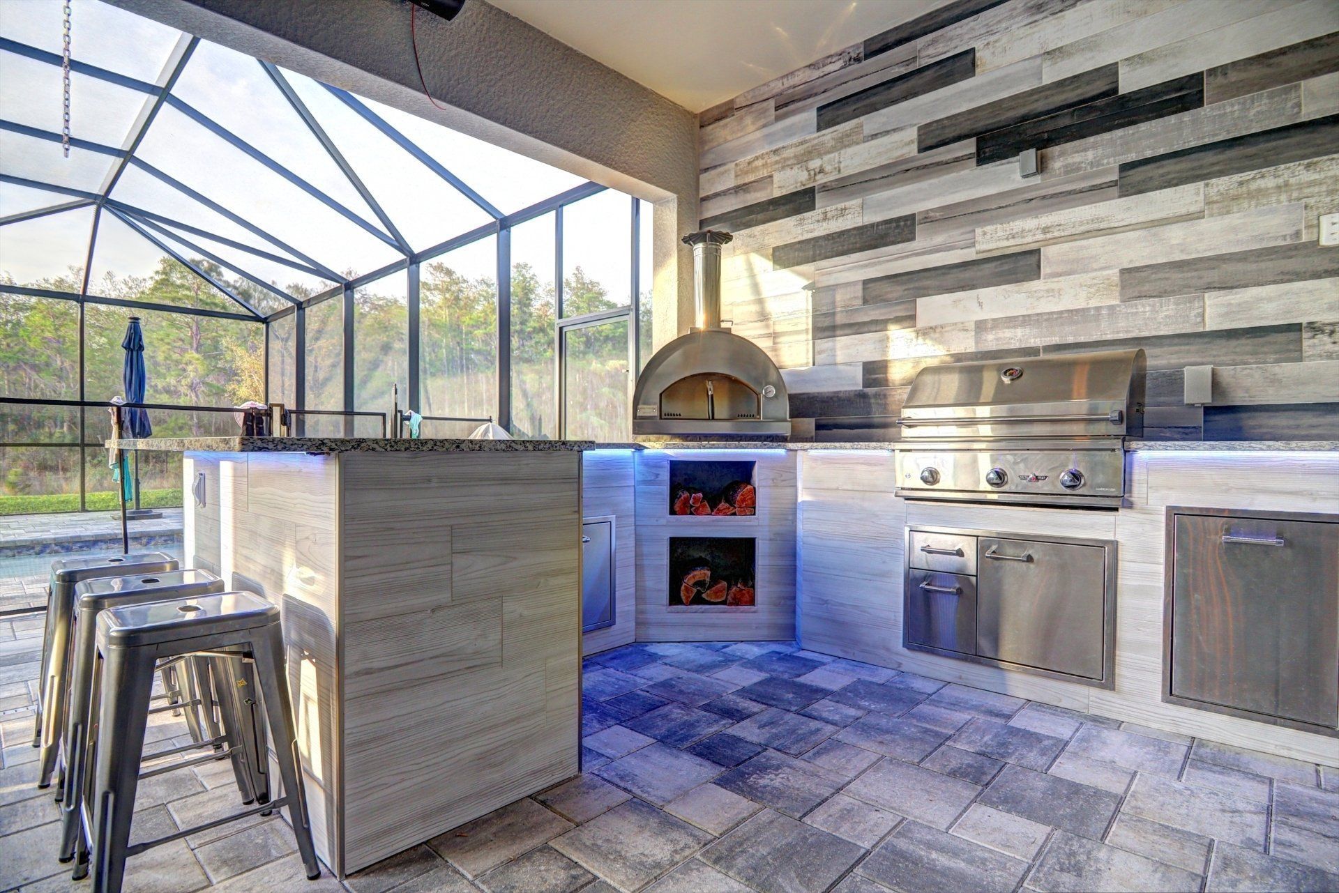 Porcelain wood look tile outdoor kitchen estero fl